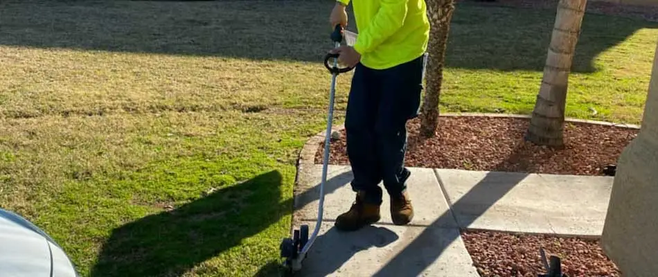 Edging around sidewalk at a home in Gilbert, AZ.